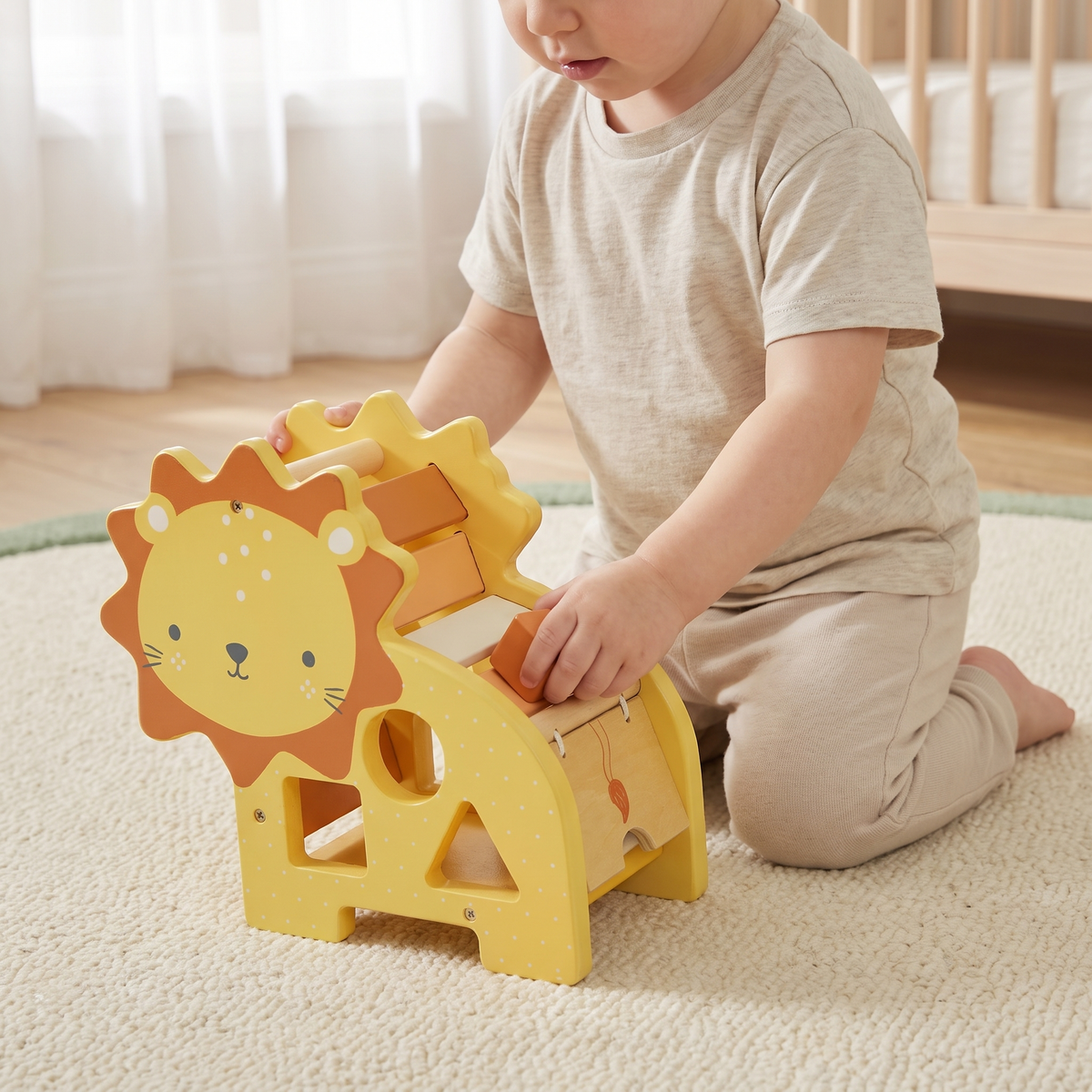 Little Teekie Personalised Wooden Lion Shape Sorter | Engraved Name, FSC Timber – Multicolour – in use, shows scale