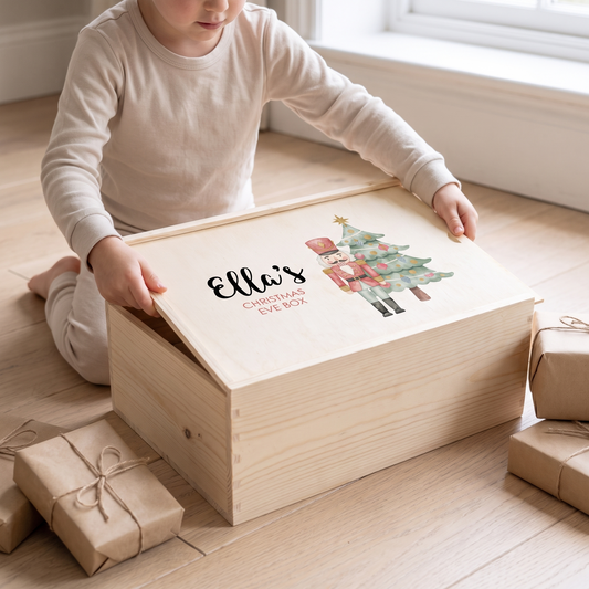 Little Teekie Personalised Christmas Eve Box | Printed Nutcracker, 35x25x14cm – Natural Wood – in use, shows scale