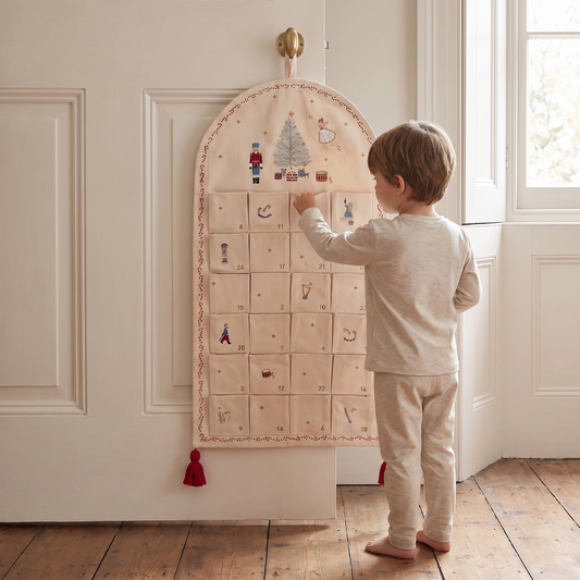 Little Teekie Fabric Advent Calendar | Embroidered Illustrations, Red Tassels – Nutcracker – in use, shows scale
