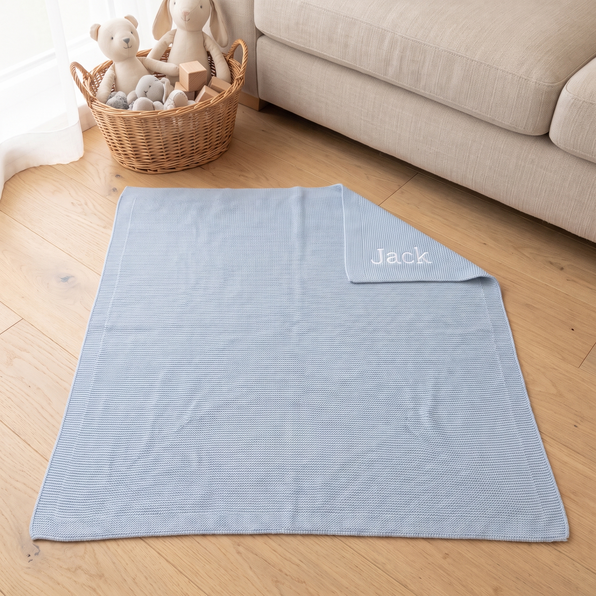 Little Teekie Personalised Knitted Baby Blanket | Embroidered Name, 80 x 100cm – Powder Blue – lifestyle