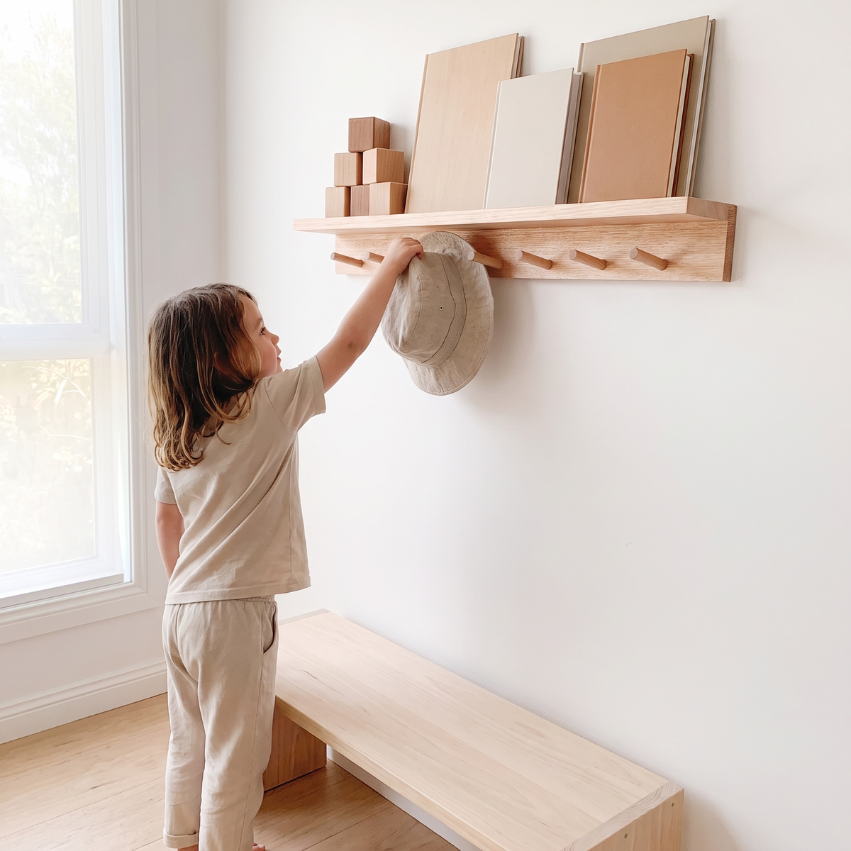 Little Teekie Peg Rail with Shelf | Wall-Mounted 80cm, 8 Wooden Hooks – Tasmanian Oak – in use, shows scale