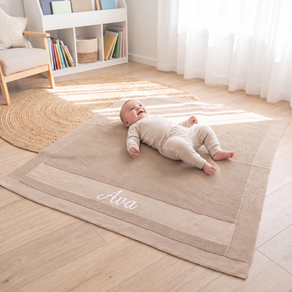 Little Teekie Personalised Knitted Baby Blanket | Embroidered Name, 80 x 100cm – Beige – in use, shows scale