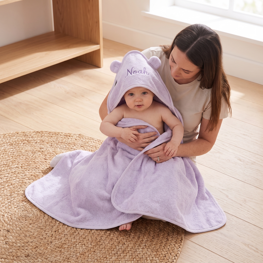Little Teekie Personalised Small Hooded Towel | Embroidered Name, 70 x 70cm – Lush Lavender – in use, shows scale